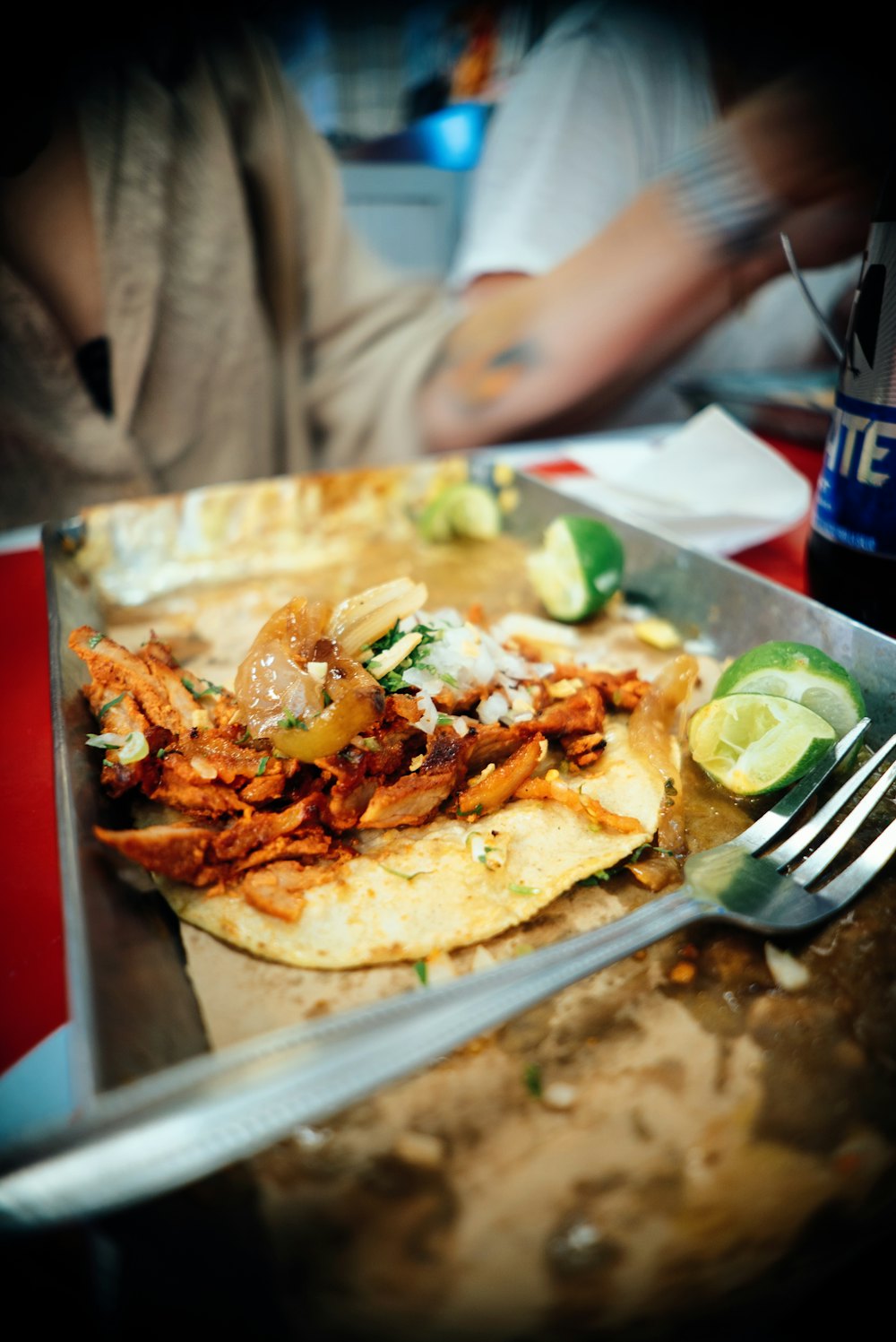 Tacos al pastor on the comal